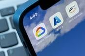 Icons representing Google Cloud, Azure, AWS on a phone